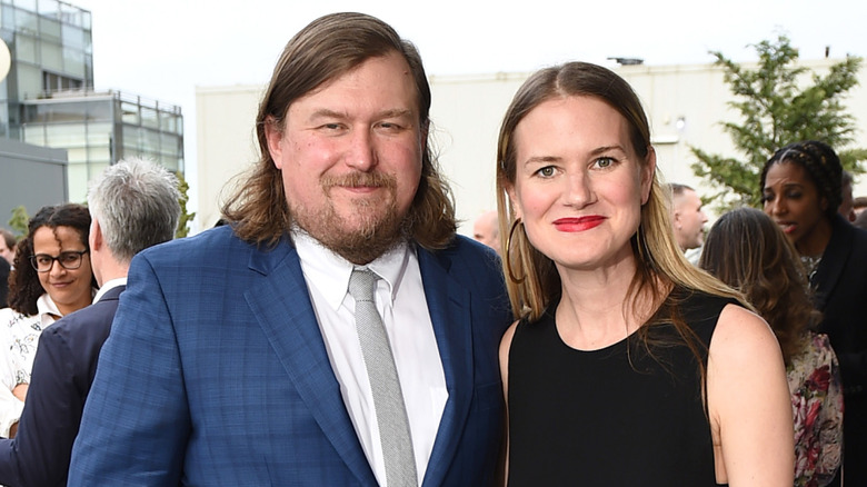 Michael Chernus in blue blazer beside his wife Emily Simoness