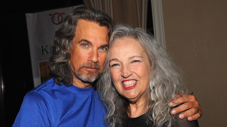 Robby Benson and Karla DeVito with long wavy hair