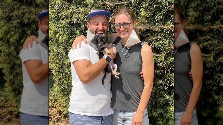 Zoe Perry and Gab Taraboulsy holding a puppy