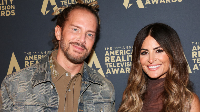 Brandt Andersen and Alison Victoria posing at an event