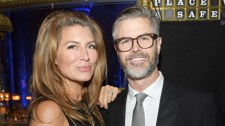 Genevieve Gorder and Christian Dunbar pose at an event