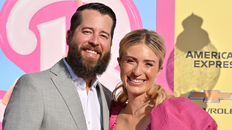 Jasmine Roth and Brett Roth posing at a movie premiere