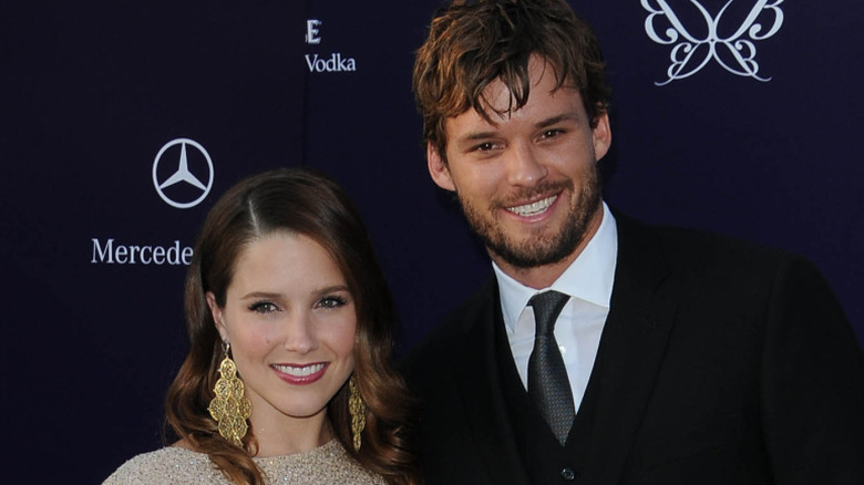 Sophia Bush and Austin Nichols posing