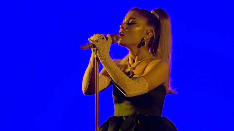 Ariana Grande singing onstage