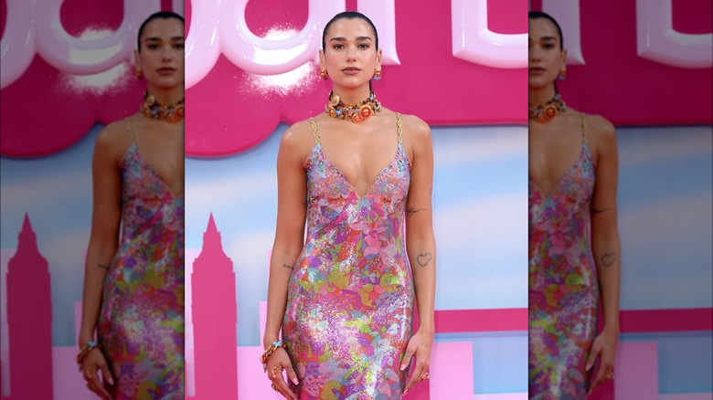 Dua Lipa posing at the European premiere of Barbie