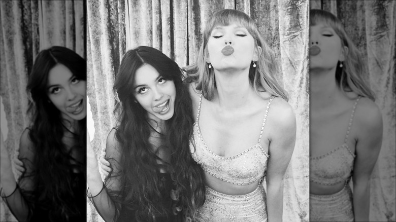 Olivia Rodrigo posing for photos with Taylor Swift