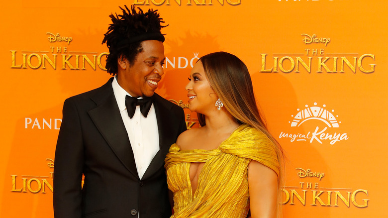 Beyonce and Jay Z smile at each other