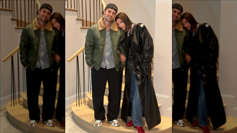 Justin and Hailey Bieber standing on stairway