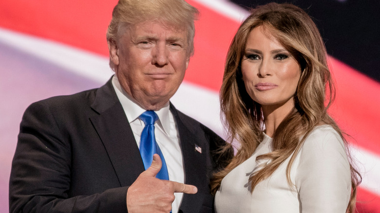 Donald Trump pointing at Melania Trump