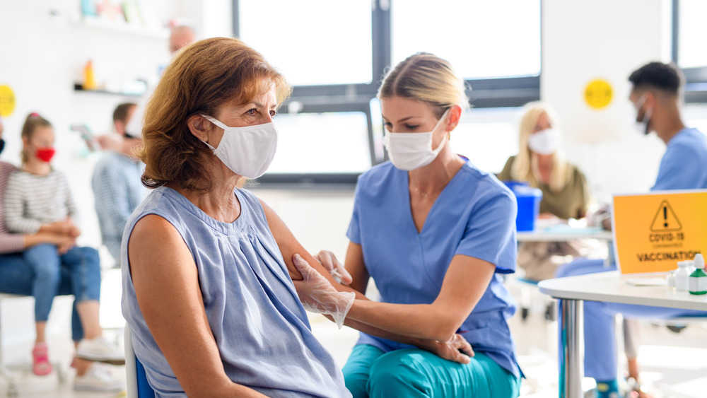 Woman getting vaccinated