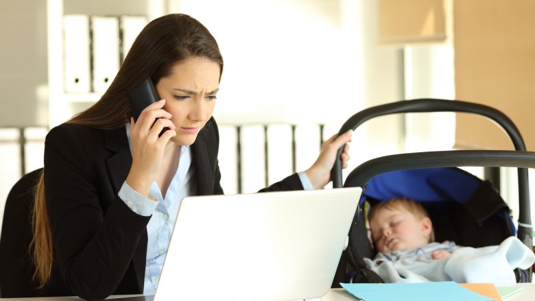 working mom with young baby