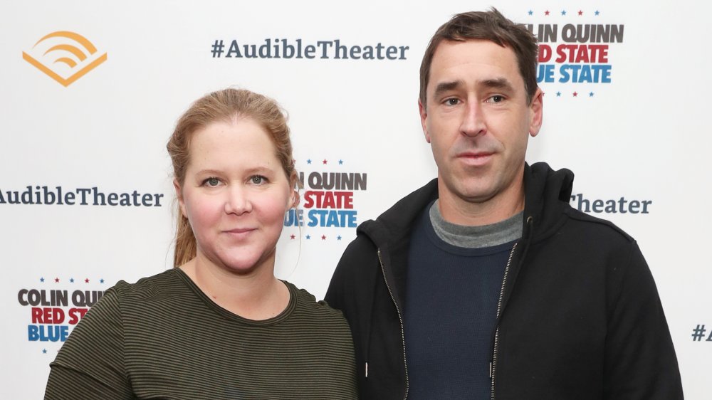 Amy Schumer and her husband Chris Fischer