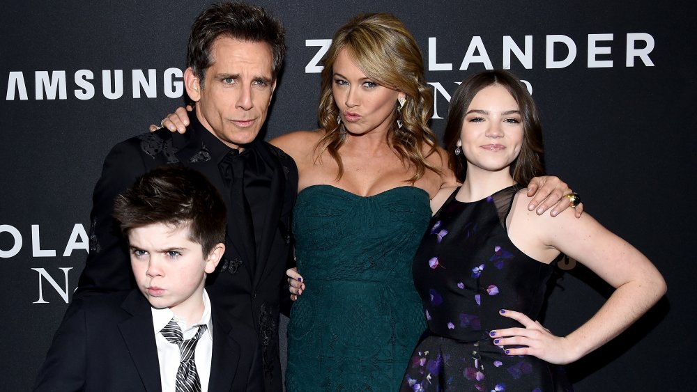 Ben Stiller and Christine Taylor posing with kids