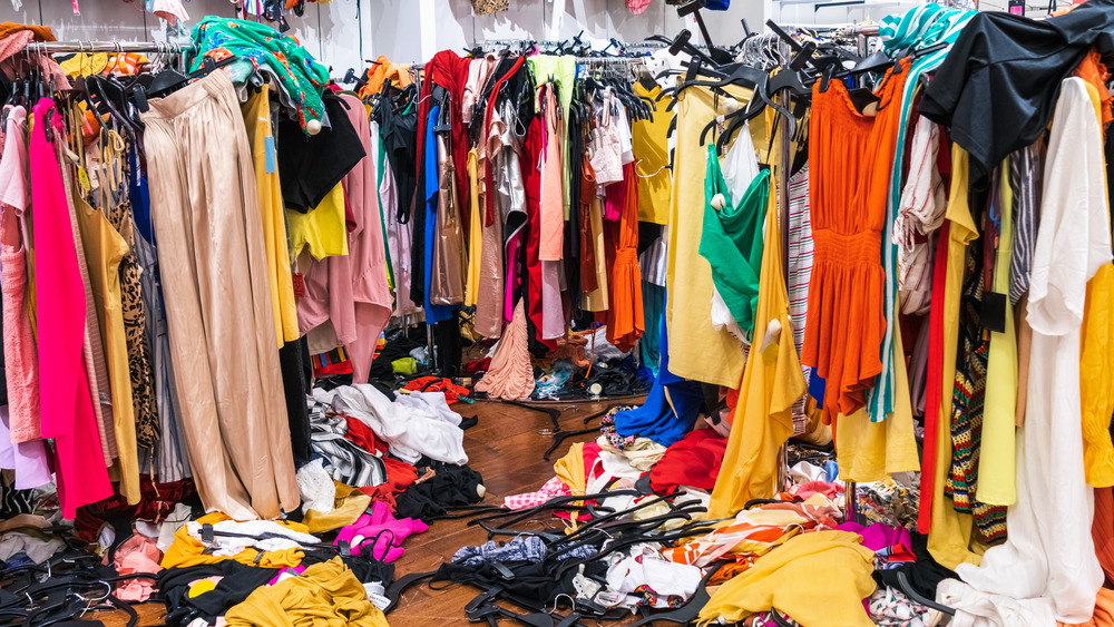 Messy, colorful clothing closet