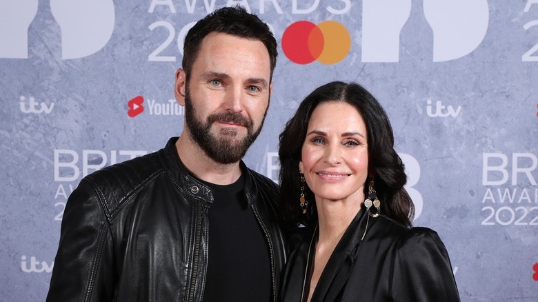 Courteney Cox and Johnny McDaid posing