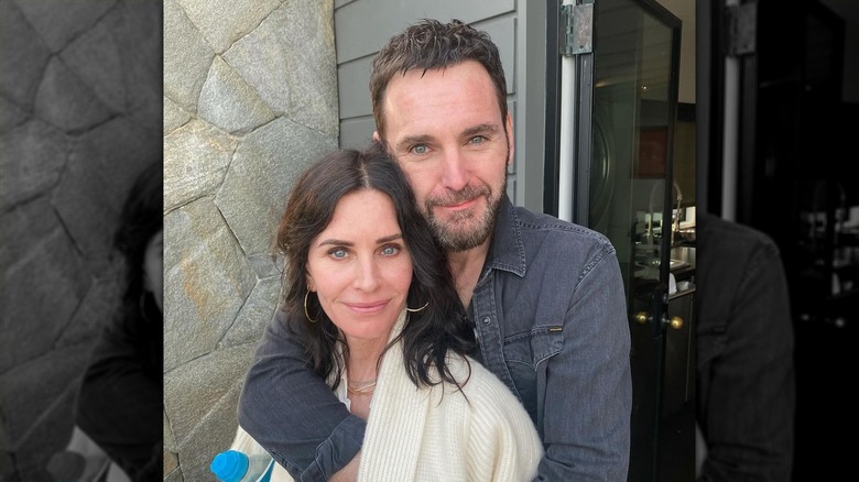 Courteney Cox and Johnny McDaid smiling