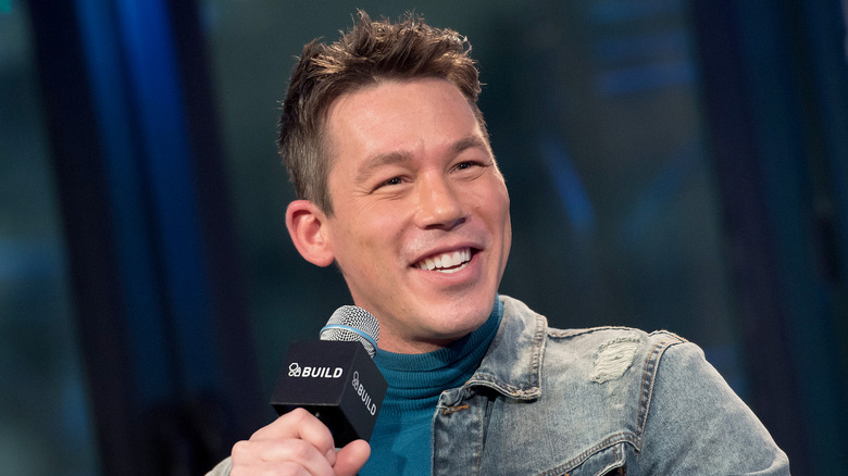 David Bromstad with a microphone