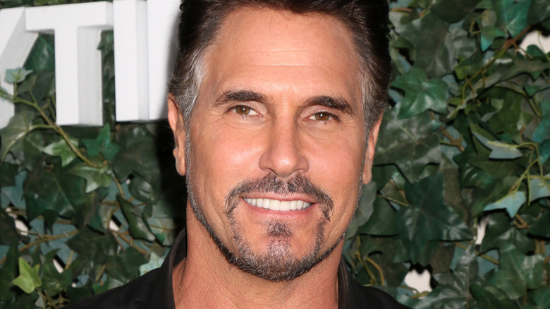 Don Diamont smiling against a leafy background