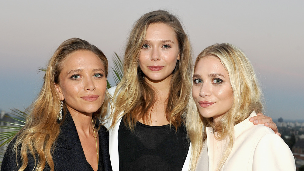 Mary-Kate, Elizabeth, and Ashley Olsen