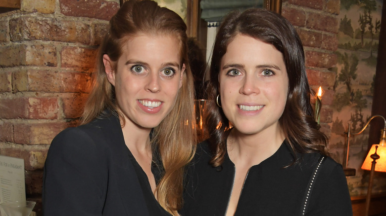 Princesses Beatrice and Eugenie smiling