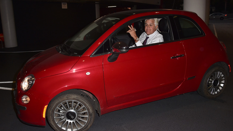 Jay Leno in a car