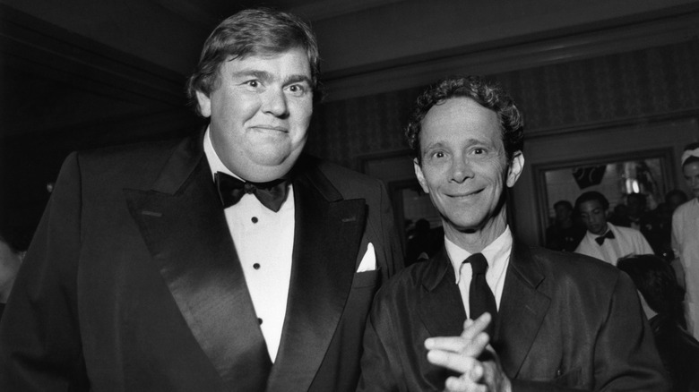 John Candy poses with actor Joel Grey