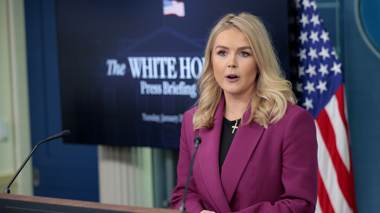 Karoline Leavitt giving a briefing at the White House