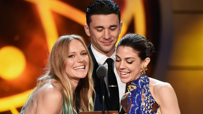 DOOL stars Kate Mansi, Marci Miller, and Billy Flynn on stage. 