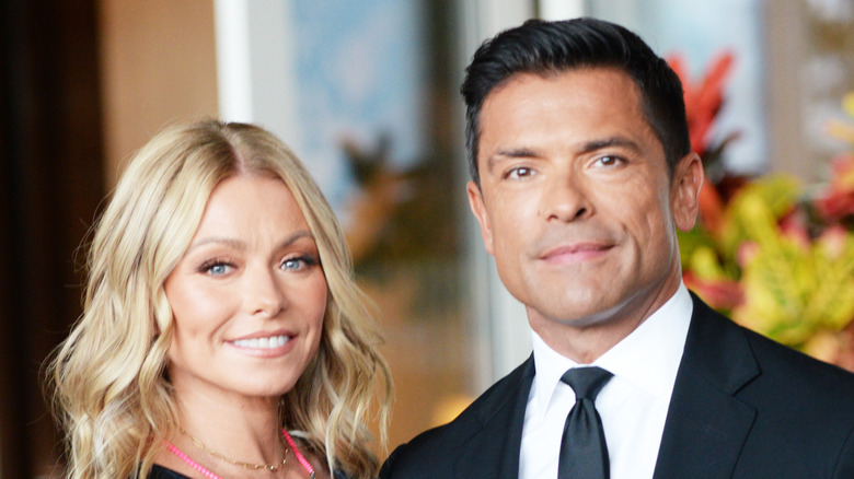 Kelly Ripa attends an event with husband Mark Consuelos