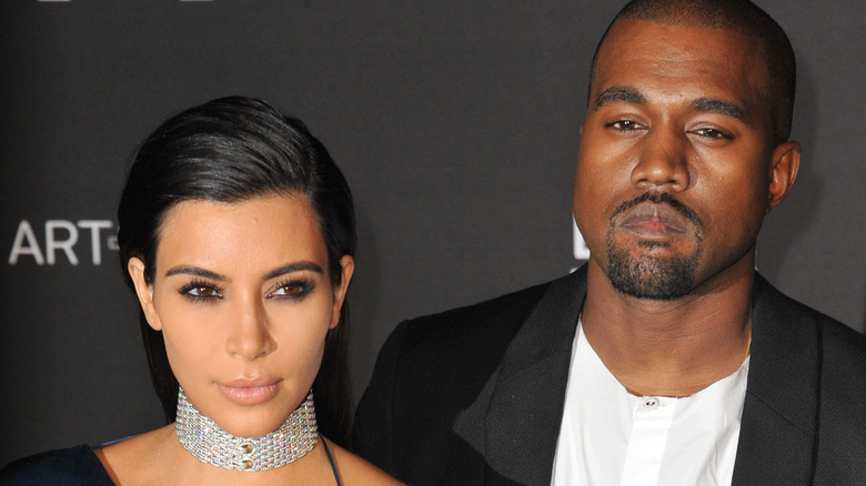 Kim Kardashian and Kanye West at an event. 