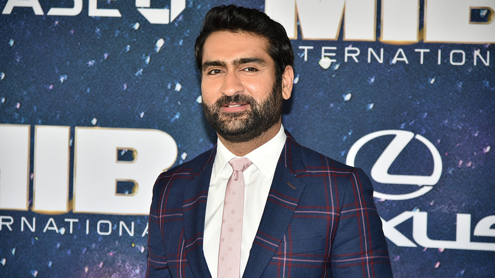 Kumail Nanjiani posing on the red carpet