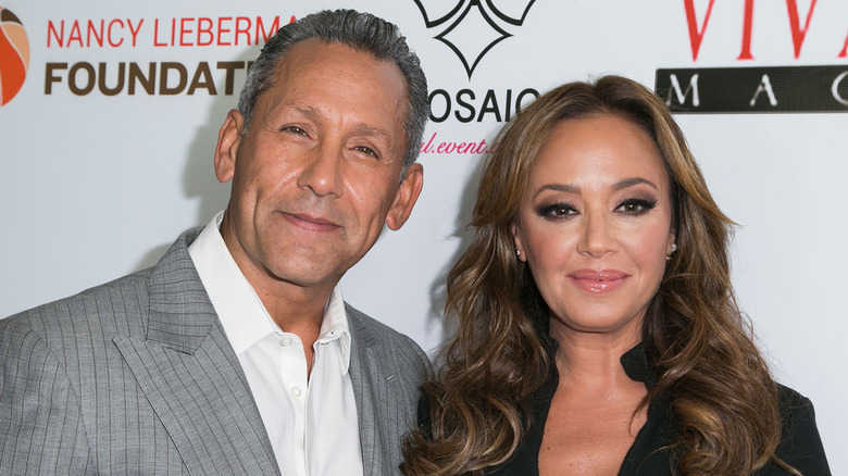 Angelo Pagan and Leah Remini at an event