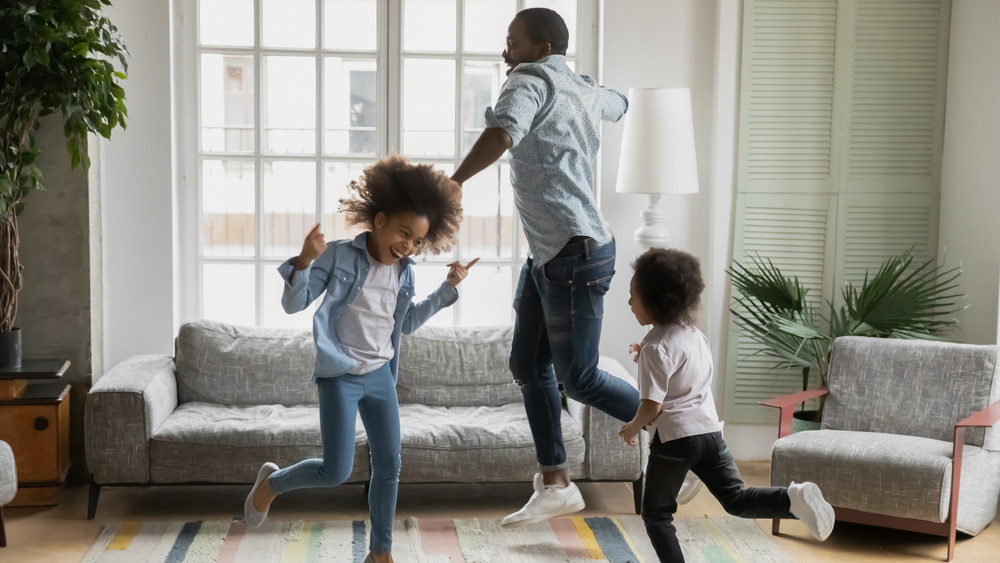 Dad dancing with kids