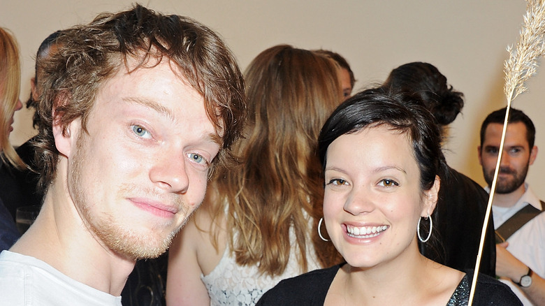 Alfie Allen, Lily Allen posing together 