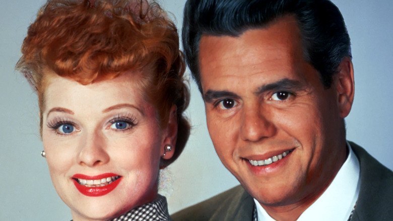 Lucille Ball and Desi Arnaz smiling