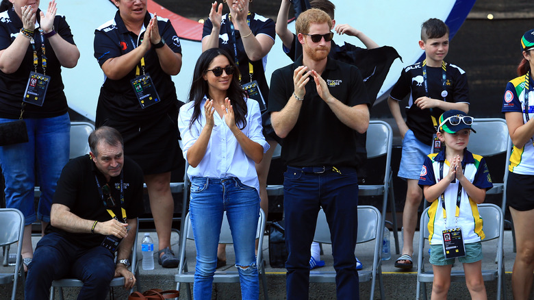 Meghan Markle wearing ripped denim