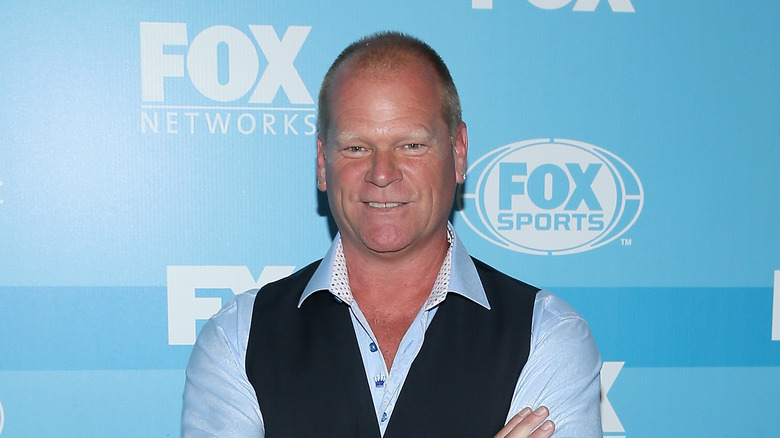 Mike Holmes smiles on the red carpet