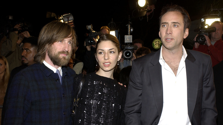 Nicolas Cage and his cousin Sofia Coppola and her ex-husband Spike Jonze enjoying the premiere of "Adaptation"