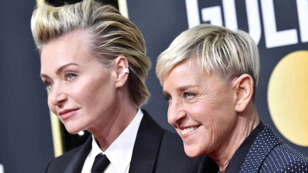 Portia de Rossi and Ellen Degeneres pose together on the red carpet