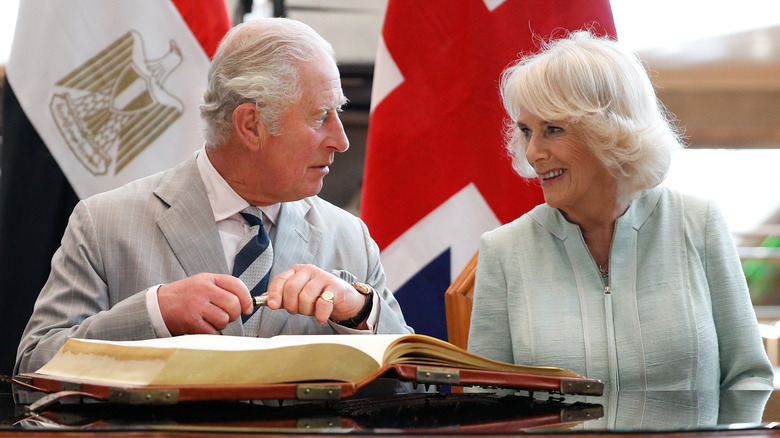 Prince Charles and Camilla Parker Bowles talking