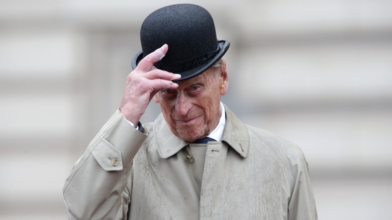 Prince Philip tips his hat