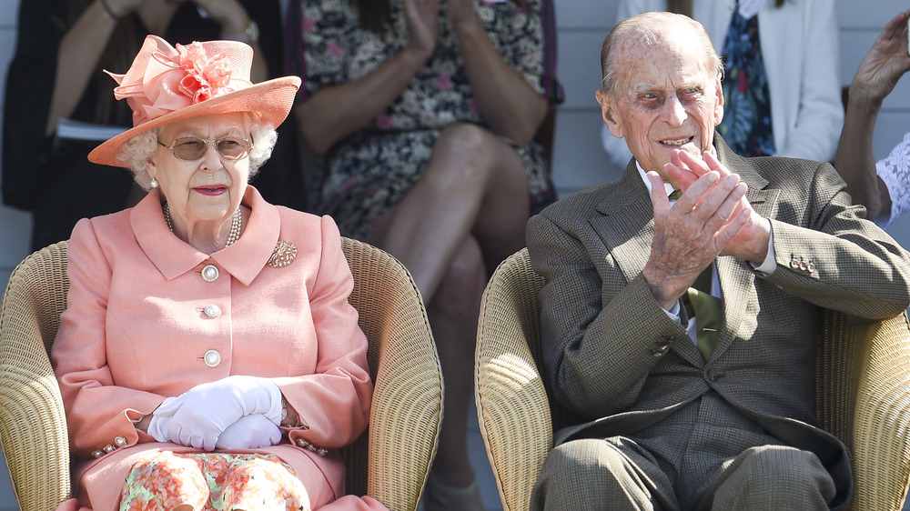 Queen Elizabeth Prince Philip cheering