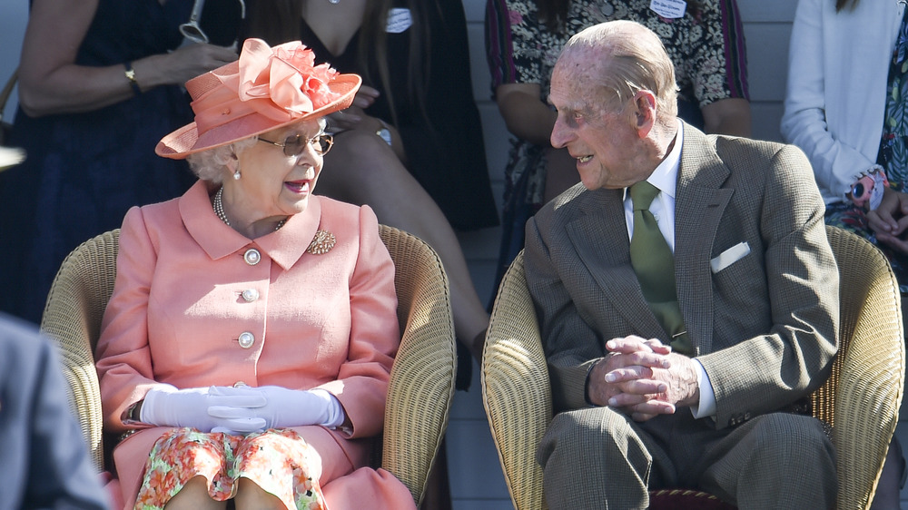 Prince Philip and the Queen talking