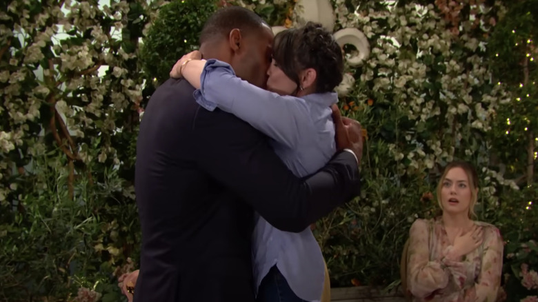 Carter and Quinn embrace