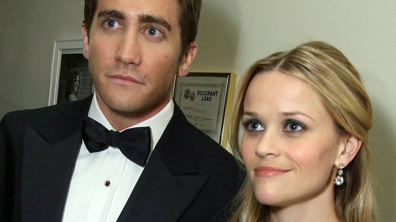 Reese Witherspoon and Jake Gyllenhaal staring