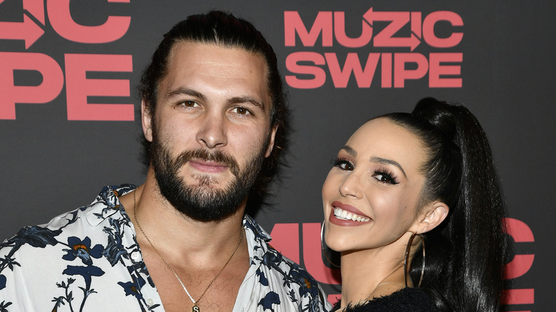 Scheana Shay and Brock Davies pose together at an event