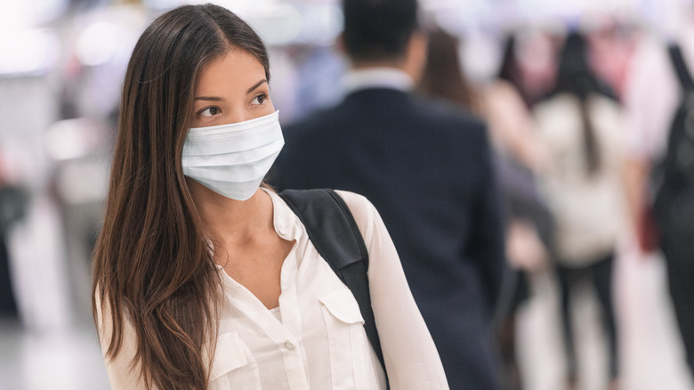 woman wearing face mask inside