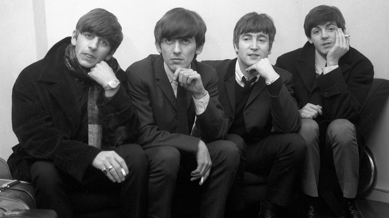 The Beatles sitting