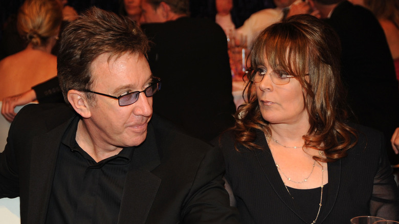 Tim Allen and Patricia Richardson looking at each other