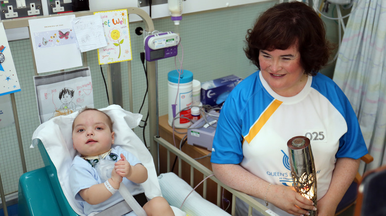 Susan Boyle with a baby